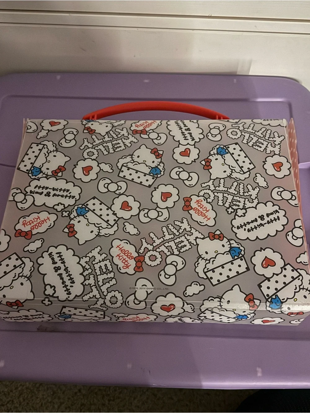Hello Kitty Purple Patterned Carry Case with Red Clasp and Pink Handle